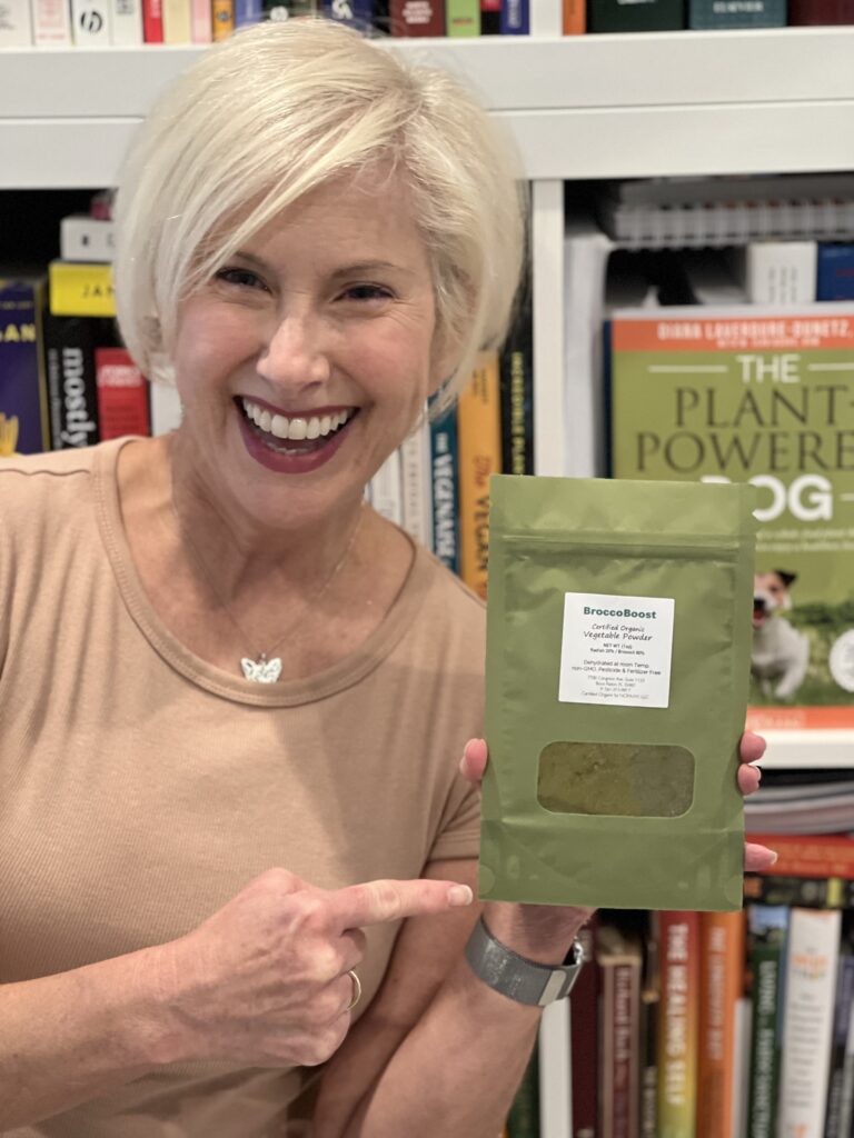 Diana Laverudre-Dunetz with her BroccoBoost Proudct - broccoli sprout powder for dogs